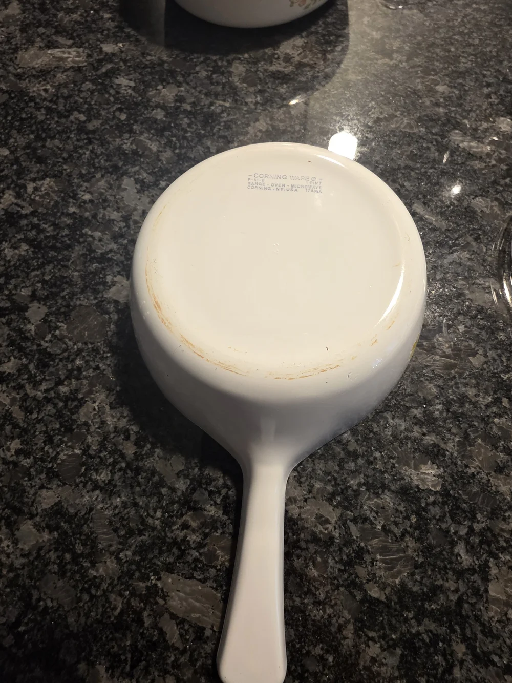 The Corning Ware Wildflower Saucepan/Skillet with Pyrex Lids.